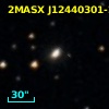 2MASX J12440301-2140581