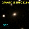 2MASX J12560216+4117340