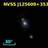 2MASX J12560925+3538115