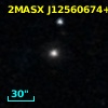 2MASX J12560674+0559537