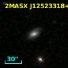 2MASX J12523318+0315176