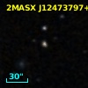 2MASX J12473797+0003271