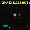 2MASX J12553973+0010297