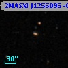 2MASXI J1255095-010529