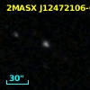 2MASX J12472106-0015051