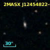 2MASX J12454822-0552243