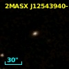 2MASX J12543940-1150581