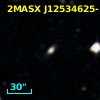 2MASX J12534625-1523207