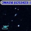 2MASXI J1253423-152830