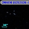 2MASXI J1252126-151853