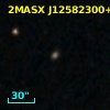 2MASX J12582300+3813344