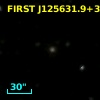 2MASX J12563190+3022465