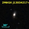 2MASX J13034217+2854199