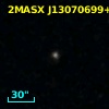 2MASX J13070699+2929403