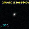 2MASX J13065640+2830133