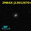 2MASX J13012670+2826097