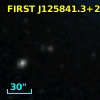 2MASX J12584129+2817156