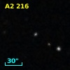 2MASS J12563651+2701334