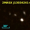 2MASX J13034241+2642239