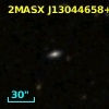 2MASX J13044658+2458565