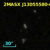 2MASX J13055580+2519547