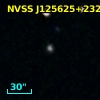 2MASX J12562544+2320545