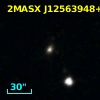 2MASX J12563948+2218375
