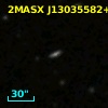 2MASX J13035582+2423349