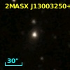 2MASX J13003250+2155203