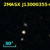 2MASX J13000355+2339531