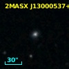 2MASX J13000537+2335371