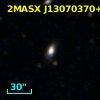 2MASX J13070370+2143467