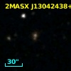 2MASX J13042438+2046095