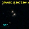 2MASX J13072304+2100217