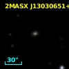 2MASX J13030651+1915579