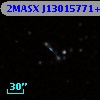 2MASX J13015771+1915116
