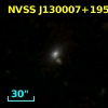 2MASX J13000700+1957531
