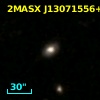 2MASX J13071556+1206211