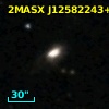 2MASX J12582243+0848429
