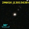 2MASX J13015638+0840522
