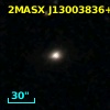 2MASX J13003836+0704533