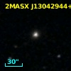 2MASX J13042944+0702261