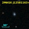 2MASX J12581163+0317462