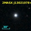 2MASX J13021078+0306239