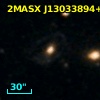 2MASX J13033894+0243352
