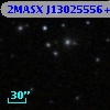 2MASX J13025556+0318441