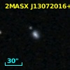 2MASX J13072016+0259564