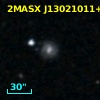 2MASX J13021011+0326009