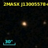 2MASX J13005578+0102312