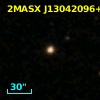 2MASX J13042096+0109038